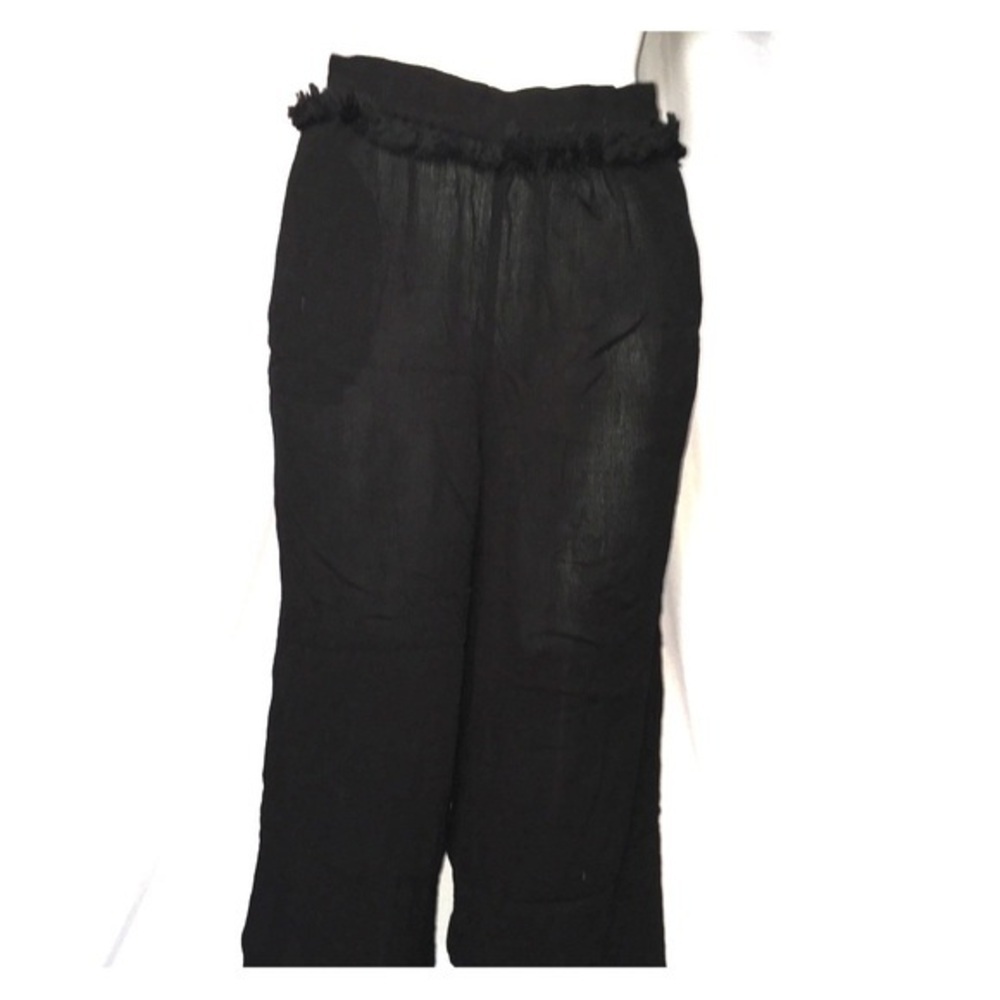 Top shop black capris with tassel accents